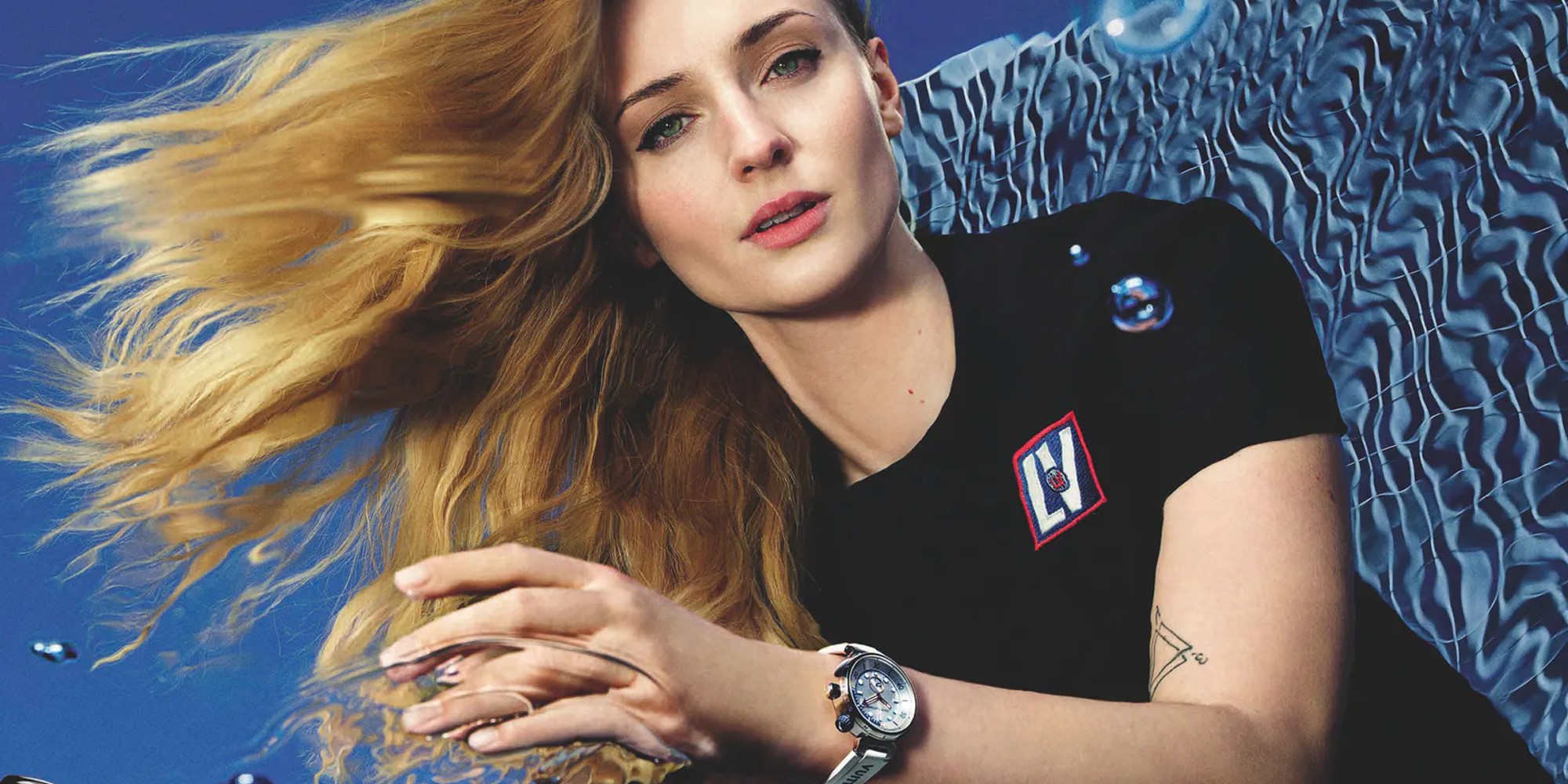 Sophie Turner Fronts Louis Vuitton's New Tambour Watch Campaign - LV Street  Driver Ad